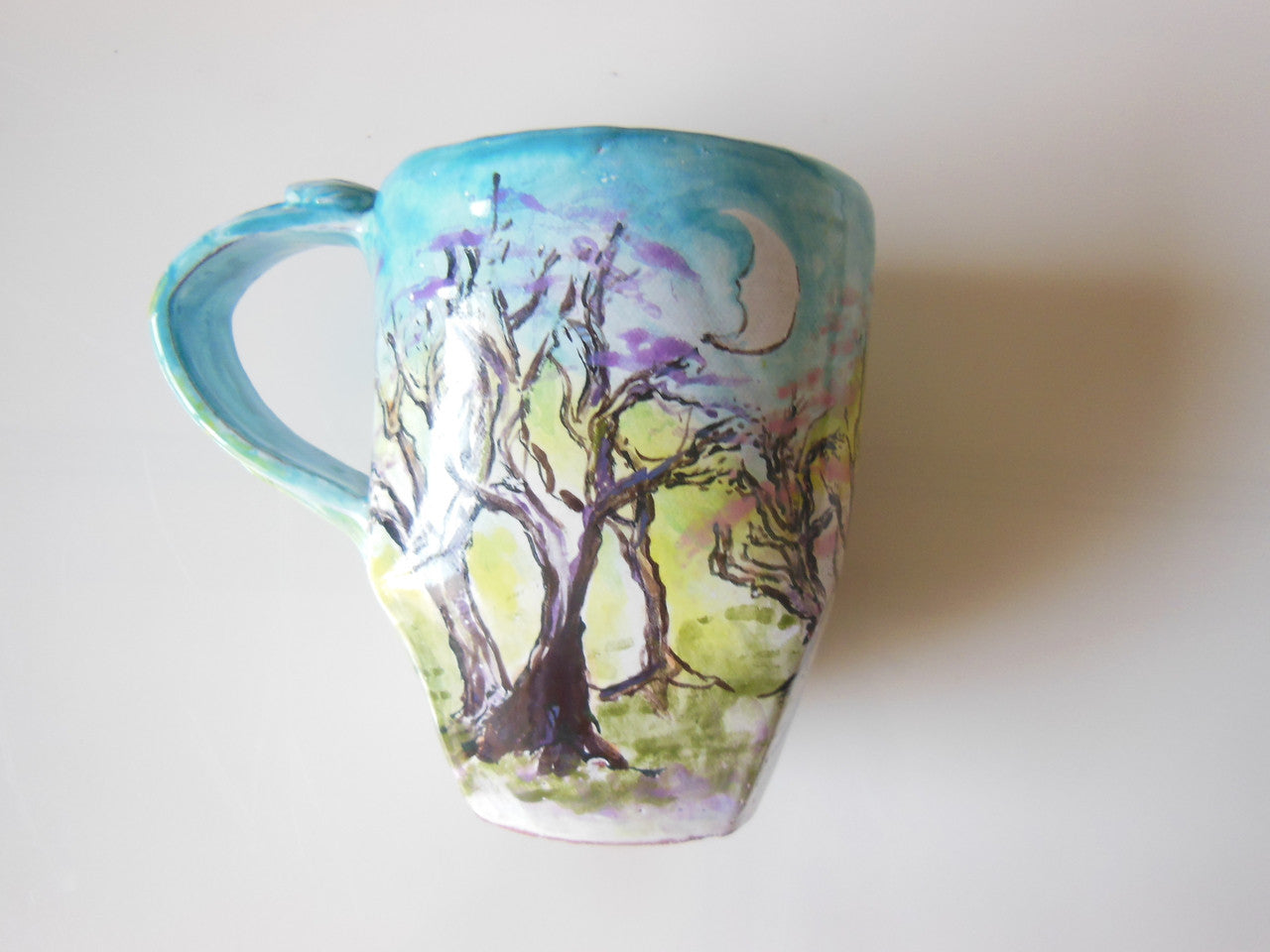 Tamara S Gordon Ceramics. Pastel hand painted trees on giant mug